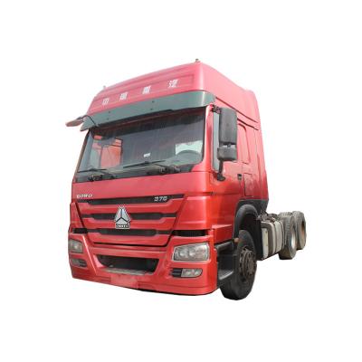 China Howo Sinotruk tractor truck euro 2 price 6x4 second hand truck tractors used tractor truck in africa 6985x2496x3230 for sale