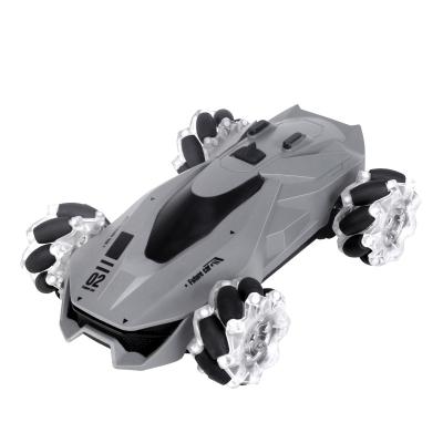 China Hot Q92 4WD RC Hobby Stunt Remote Control Car 360 Degree Flip Effect Tire Dynamic Sound Effect Model Toys Simulation Spray Night Glare for sale