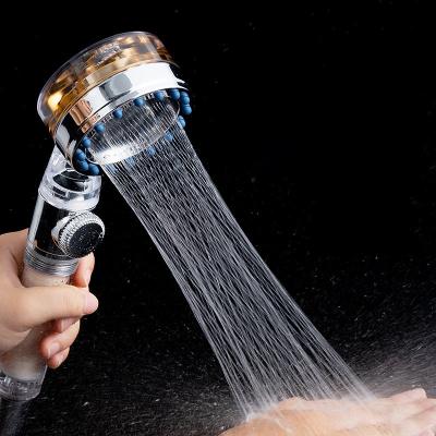 China Needle Free New 2022 High Pressure Rotating 360 Degree Rotating Fan Hand Showerhead With Small Turbo Fan Water Spray Shower Head for sale