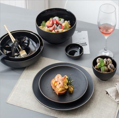 China Viable Wholesale Ceramic Black Gold Rim Flat Round Steak Dish Dish Bowl Porcelain Dinnerware for sale