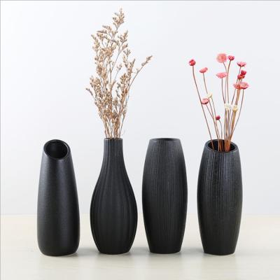 China Hot Selling Europe Handmade Matte Black Flower Ceramic Vases For Home Decoration for sale