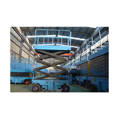 China Hotels 12m Battery 10m Movable Hydraulic Trailer Scissor Table Platform Manlift Scissor Lift Electric Scissor Lift for sale