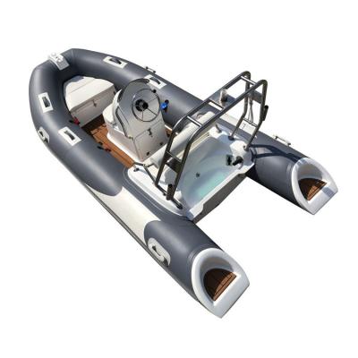 China water sports & Entertainment 1.2mm PVC CE 3.9m Fiberglass Hull Inflatable Boat With Outboard Engine for sale