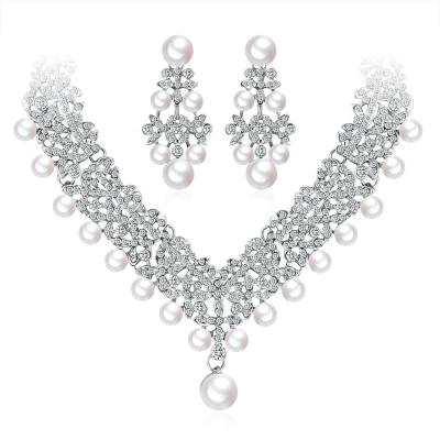 China FASHIONABLE Temperament Pearl Alloy Rhinestone Necklace Earring Sets For Women Wedding Banquet Bridal Accessories Sets Jewelry for sale