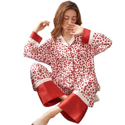 China Youth Leisure QUICK DRY Warm Christmas Fashion Silk Pajamas Sets Button Down Nightgrown Satin Outfit Pajamas for sale