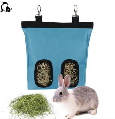 China Waterproof hanging grass guinea pig chinchilla guinea pig rabbit HANDOU rabbit hay bag fabric grass holder large capacity anti-weed shedder for sale