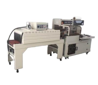 China Automatic Food Bottle Shrink Wrapping Film Machine With Low Price for sale