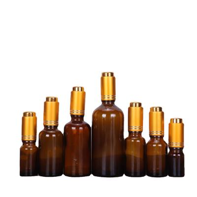 China Brown Essential Oil Bottle 5ml 10ml 15ml 20ml 30ml 50ml 100ml Cosmetic Glass Dropper Bottle for sale