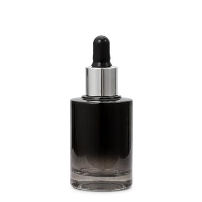 China Cosmetic Bottle 1oz Translucent Black Glass Flat Shoulder Dropper 30ml Essential Oil Bottle for sale