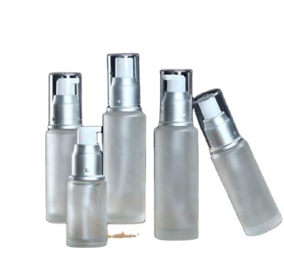 China 30ml cosmetic cosmetic 50ml 80ml 100ml frosted glass bottle pump lotion bottles with logo printed for sale