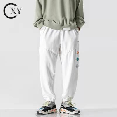 China new solid color Japanese basic youth brand fashion Anti-wrinkle pants campus sports trending stylish sports tracksuit for men for sale