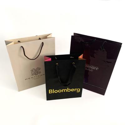 China New Fashion Handmade Custom Embossed Luxury Embossed Logo Cotton Rope Handle Gift Paper Tote Bag Art Paper Bags With Black for sale