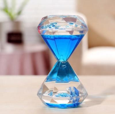 China Minimalist Creative Double Color Floating Hourglass Liquid Acrylic Visual Timer Motion Hourglass Oil Decoration Gift Home Decor for sale