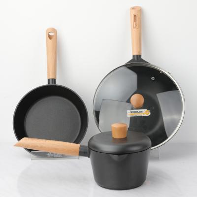 China Amercook fusomoku stocked kitchen be careful cooking hot pot non stick cook ware set wooden handle cookware set for sale