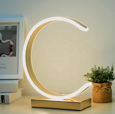 China Creative Modern Aluminum Touch Switch Table Lamp Ring Shape LED Table Light 15w for sale