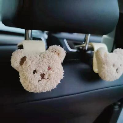 China Fancy New Arrival Mini Cartoon Bear Car Seat Hook Headrest Hanger Multifunctional Backseat Hook for sale