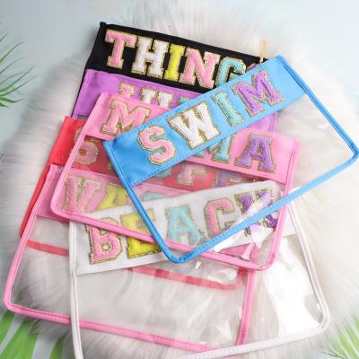 China 2022 New Fashion Monogram Travel PVC Transparent Letter Mom Things Beach Patch Cosmetic Bag Clear Nylon Pouch Bag With Zipper for sale