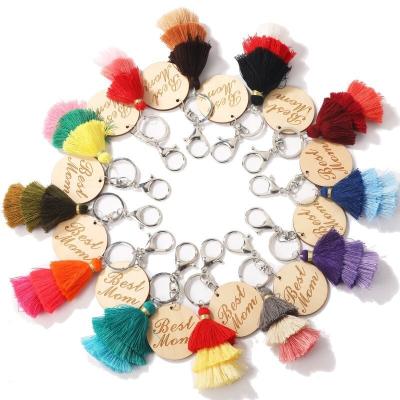 China Bohemia Fashion Handmade Colorful Fringe Cotton Three Color Key Chain Personalized Engraved Letter Mom Disc Wooden Tassel Key Chain for sale