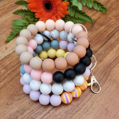 China Fashion Candy Color Fashion Silicone Elastic Bead Bracelet Colorful Key Chain For Car Key Women Wristband Pendant Key Ring for sale