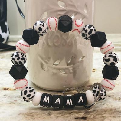 China New Fashion Design Sports Baseball Pattern Silicone Beaded Bracelet Key Chain Cow Beads Letter Wristlet Mom Key Chain For Mom Gifts for sale