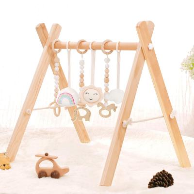 China Eco-friendly.anti-slip.water-proof Wooden Baby Gym Toys Hanging Toys For Rattan Baby Gym Play Mats Kids Bedroom Room Daycare Furniture Custom Wooden Play Gym for sale