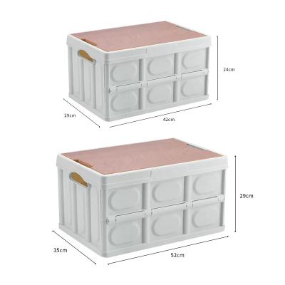 China Multifunctional plastic folding outdoor storage box car wood home camping box folding cover portable barrels storage box for sale