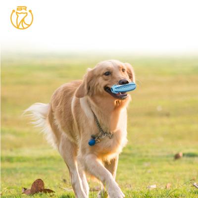 China New Viable Dog Toys 5cm Rugby Chewing Rubber Treat Pet Ball Dog Toys for sale