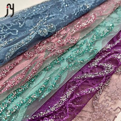 China Last aso ebi lace Tulle lace clear handmade viable lace glue waterproof rhinestone lace for OEM custom for sale