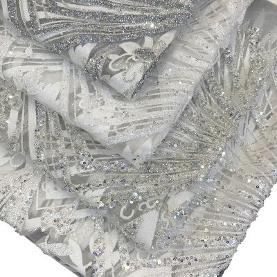 China TF80303 2021 Viable Gliiter Embroidery Fabric Nigeria Lace Fabrics White Bridal Sequins And Stoned Lace Fabrics For OEM Customization for sale