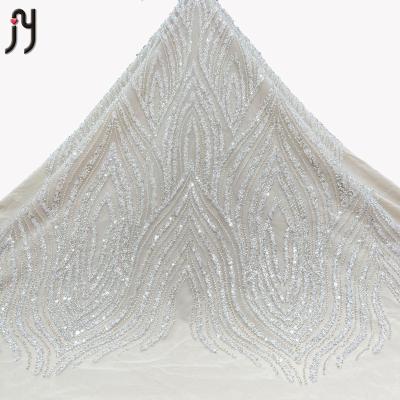 China New Viable Indian Heavy Beaded Lace And French Embroidery Tulle Fabrics Lace Sequin For Bridal Dress for sale