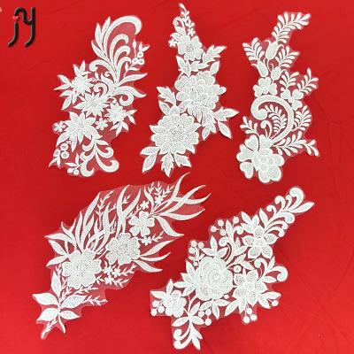 China 2022 Latest Viable African Lace Beads Tassel Lace Flower Applique White Beaded Net Sequins Lace Fabric For OEM Custom for sale