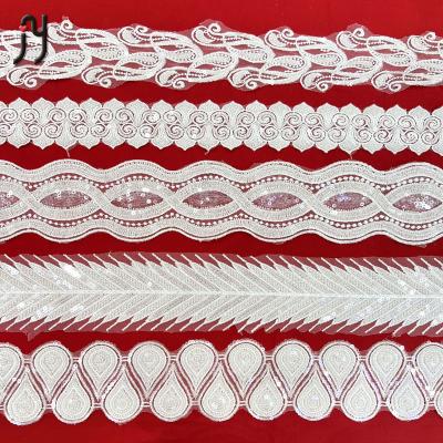 China 2022 elastic nigerian white beaded sequins lace up fabrics 3d beads lace up sequins for clothing for sale