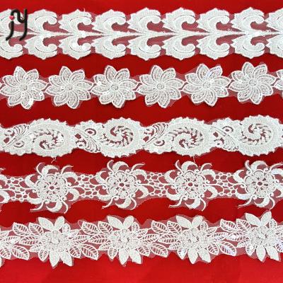 China New Elastic White Beaded Nigeria Lace Embroidery Wedding Mesh Lace Fabrics for sale