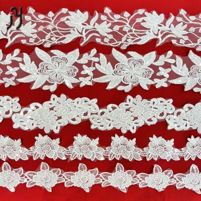 China 2022 viable luxury French sequins lace fabric dress textile embroidery lace zakar fabric with machine beaded fabric for sale