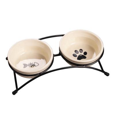 China Wholesale Viable Luxury Ceramic Frame Iron Double Bowl Pet Cartoon Bowl Dog Food Bowl for sale