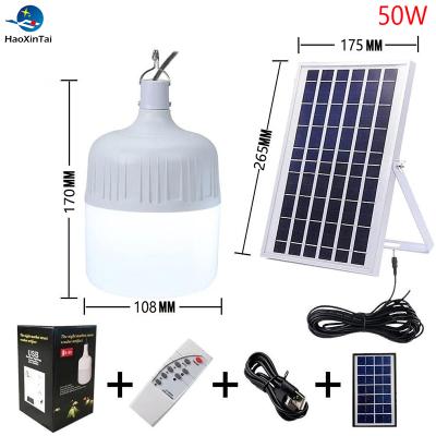 China Warehouse Haoxintai 120w Lamp Emergency Rechargeable Solar Led Bulb Light for sale