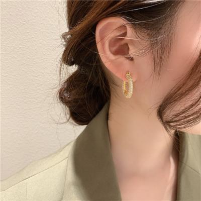 China Trendy Personalized Fashion Earrings Micro-inlaid Geometric Zircon Circle Earrings For Women for sale