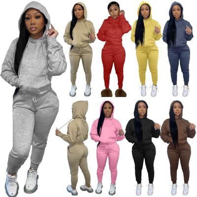 China Autumn And Winter Breathable Fleece Striping Casual Hooded Sweater Sports Suit Women Sweater Two Piece Set for sale