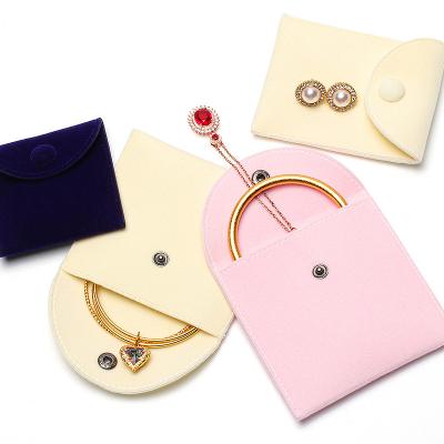 China Fashionable Wholesale Jewelry Packaging Bag Pile Purse Button Pouch Thickened Velvet Pouch Ring Necklace Fine Collection Bag for sale