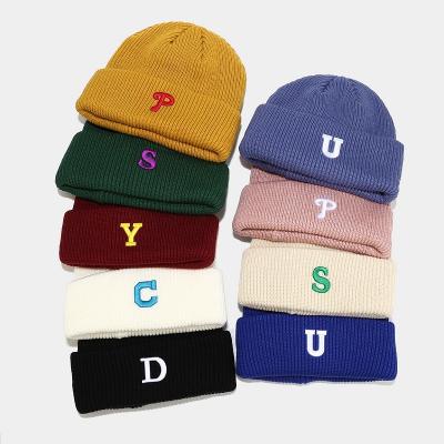 China COMMON Cute Warm Hat Trend Winter Solid Color Outdoor Slouchy Knit Hat Men And Women Letter Embroidery Beanie Hats for sale