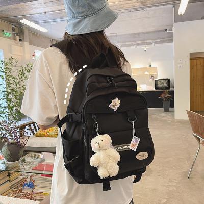 China Fashion Waterproof Wholesale Japanese School Bags For Female Student Big Book Bag University Solid Color Cute Backpacks for sale