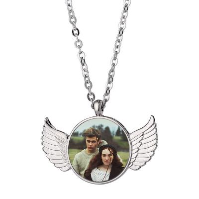 China Fashion Jewelry Blanks Angel Wing Necklace Round Pendant Custom Photo Handmade White Printable MDF Necklaces For Women for sale