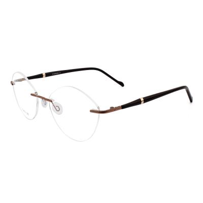 China Small Fashionable Modern Transparent Polygon Titanium Rimless Eyewear Women for sale