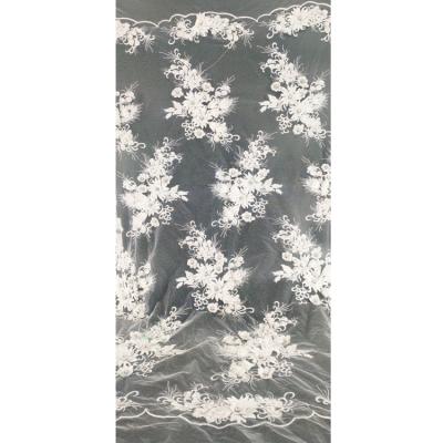 China Viable wholesale latest designs white flower with diamond lace fabric design embroidery charm fabric for sale