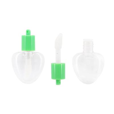 China Cosmetic Wholesales Empty Container Heart Shaped Perforated Pendant Tube Lip Gloss Tube Container for sale