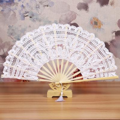 China China 27cm A Grade Bamboo Top Quality White Lace Wedding Fan Bamboo Crafts for sale