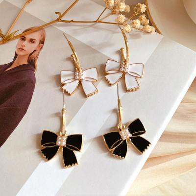 China CLASSIC Hot Selling Silver Retro Fashion Accessories Jewelry Gift 925 Needle Alloy Oil Drip Bow Stud Earrings for sale