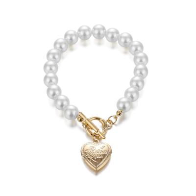 China Peach Korean CLASSIC Simple Natural Freshwater Heart Chain Pearl Pendant Bracelet For Women Girls for sale