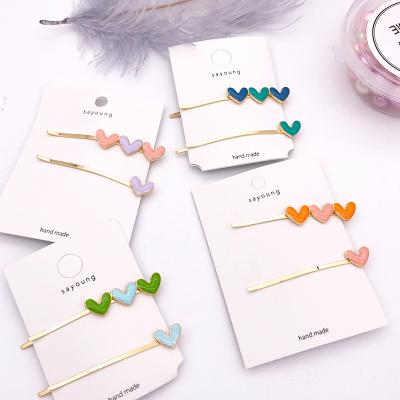 China Japan and Korean style wholesale oil drop heart hairpins accessories for women girl candy fashion romantic gold jewelry hair clips set for sale