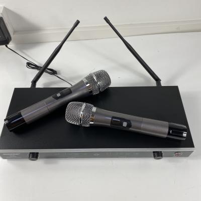 China Professional Wireless Karaoke Microphone UHF Microphone Handheld Rechargeable Two-handed Wireless Microphone Channel UHF for sale